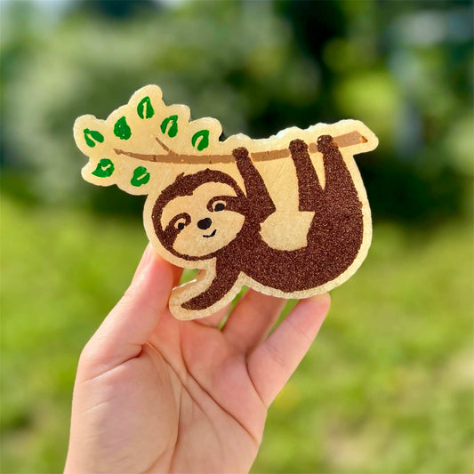 Sloth Hanging from Branch